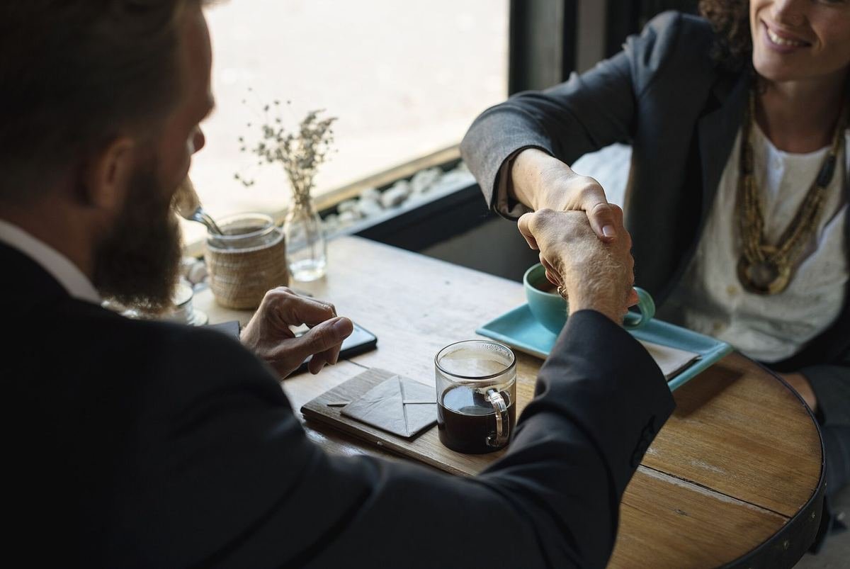 Business agreement handshake