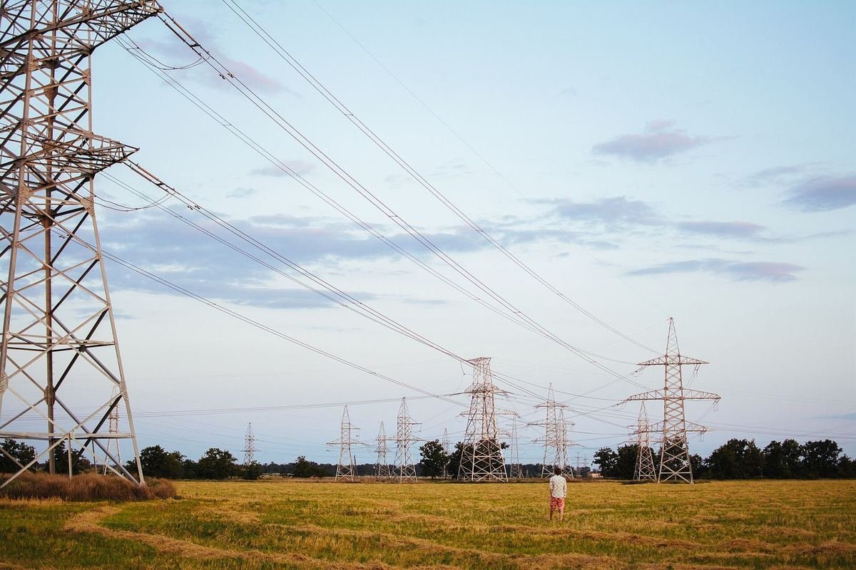 High-voltage power lines across open country